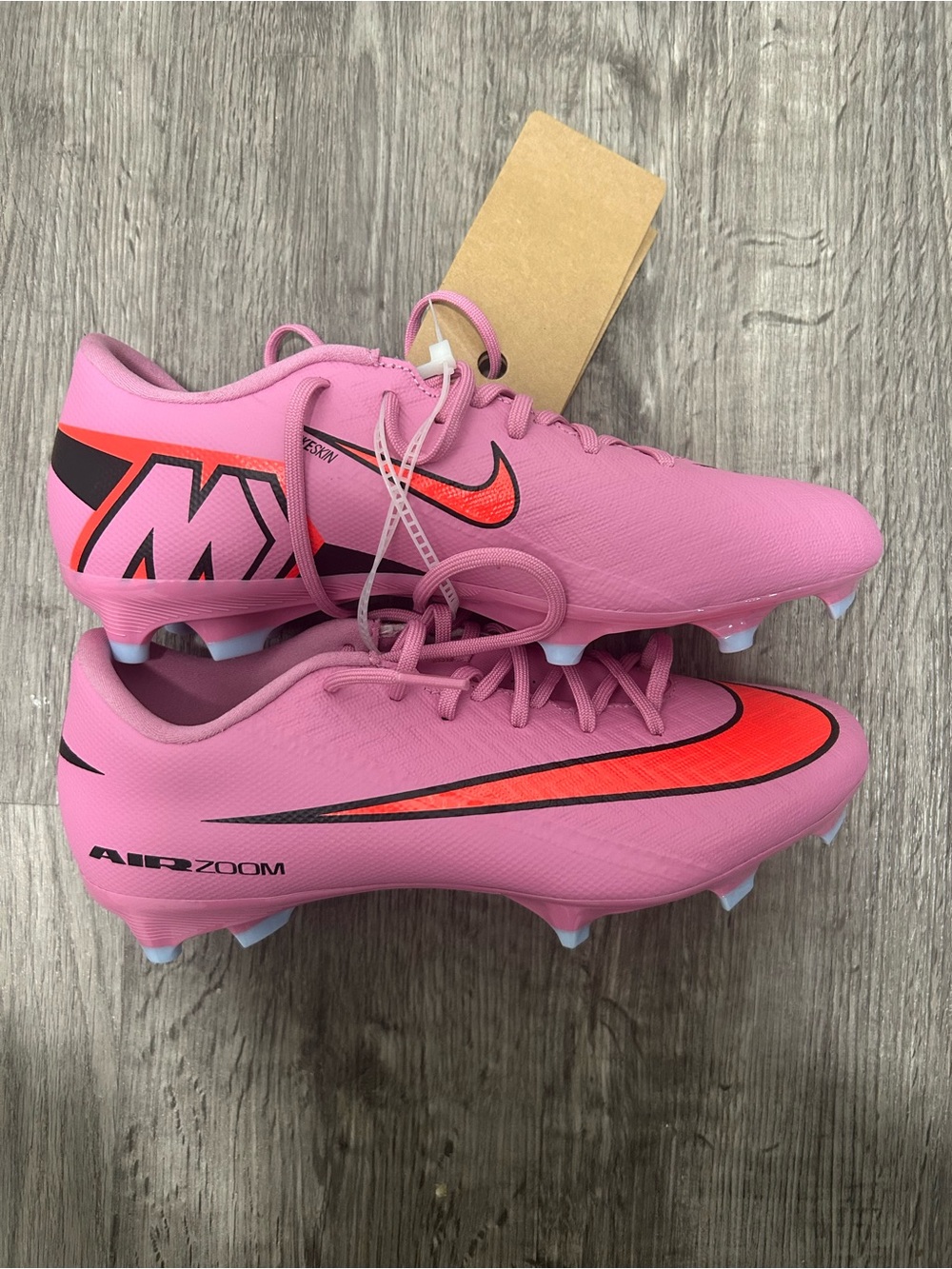 Nike Women’s Pink Football Cleats with Red Accents